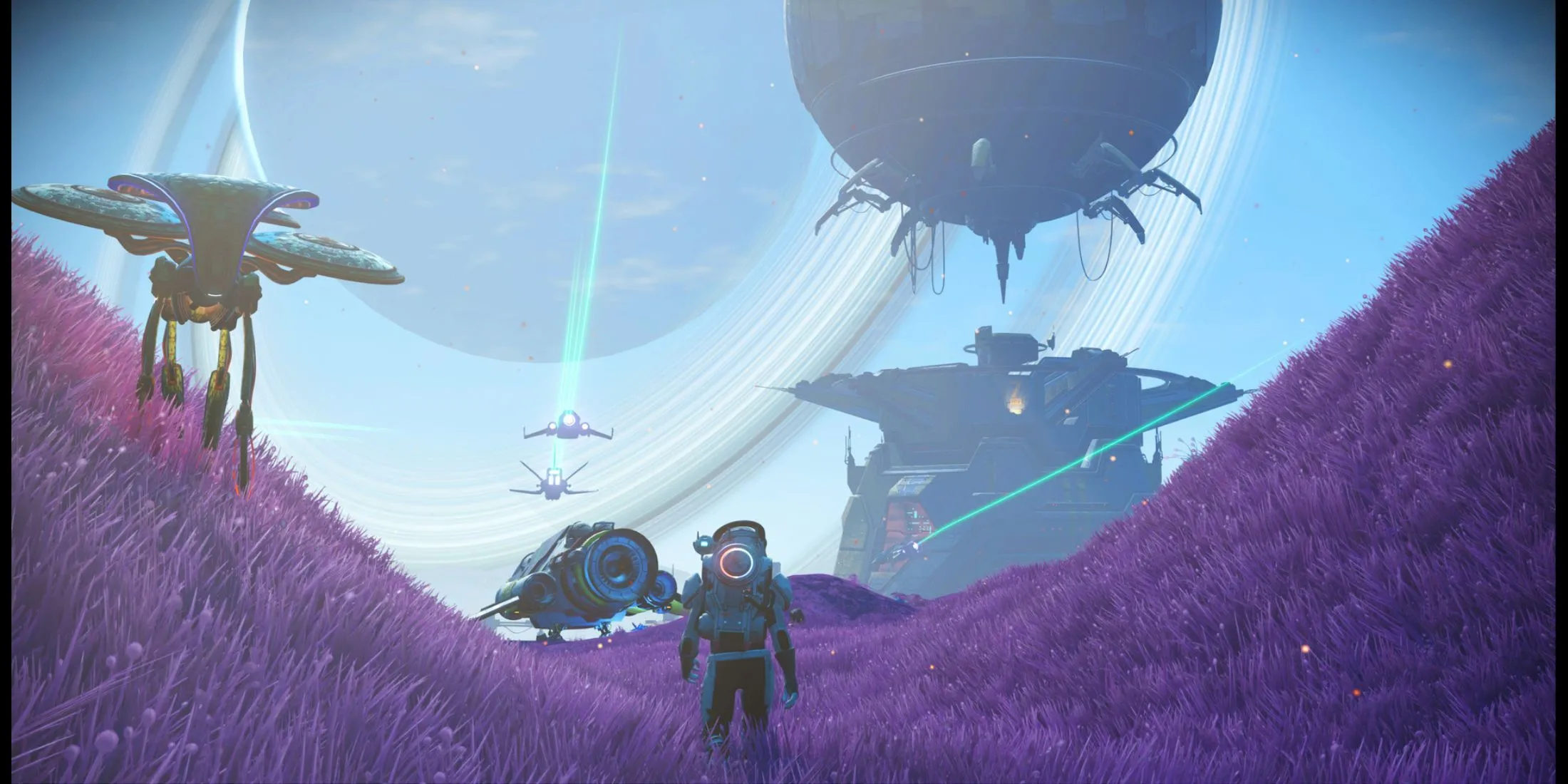 Người chơi đứng trên hành tinh, tàu vũ trụ và công trình xây dựng hiện ra xa xa trong No Man's Sky