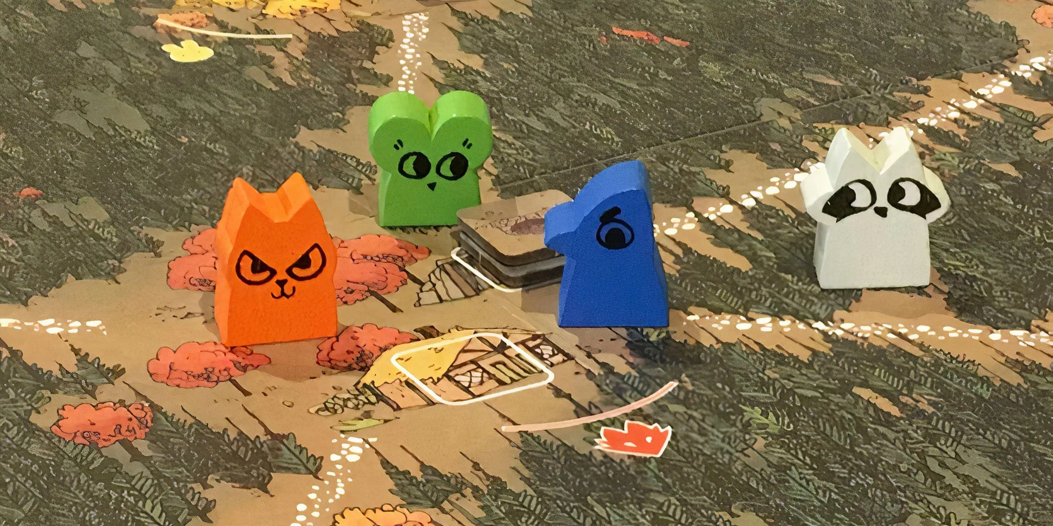Các quân cờ hình thú rừng trên bản đồ board game Root, minh họa lối chơi tranh giành lãnh thổ