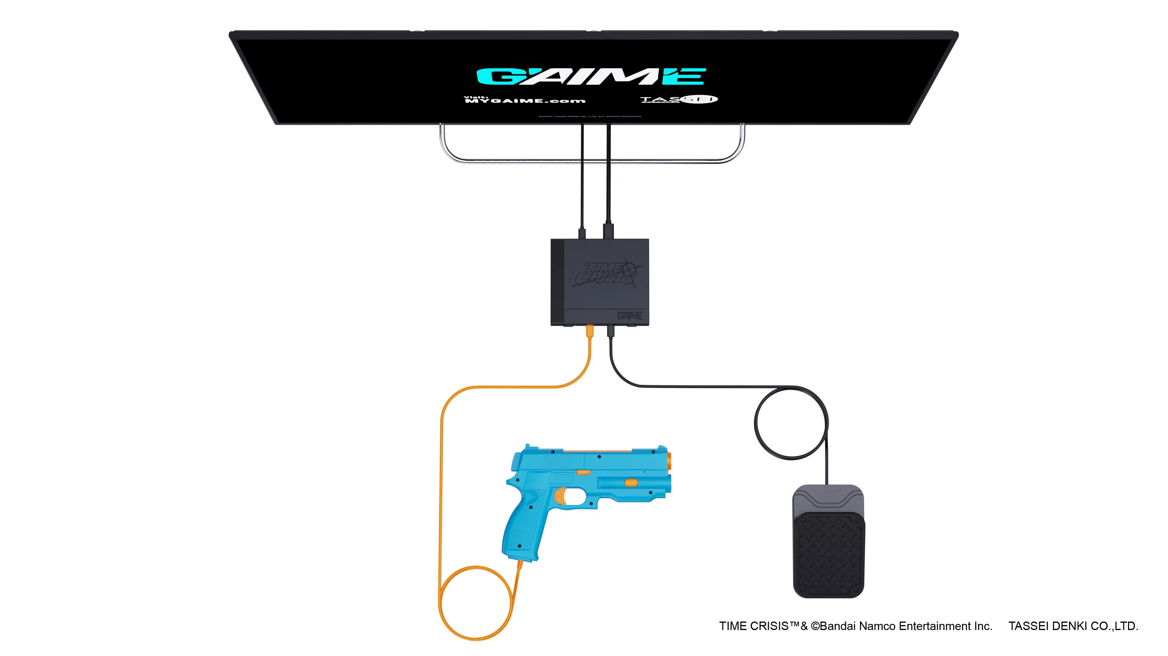Hệ thống G’aim’e Plug &amp; Play bao gồm súng và hộp điều khiển đặt cạnh TV, mô phỏng cách chơi game thùng tại gia.