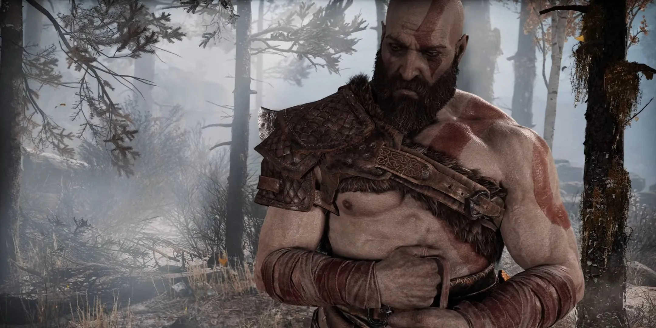 Kratos với vẻ ngoài điềm tĩnh, ẩn chứa nội tâm phức tạp trong God of War (2018).