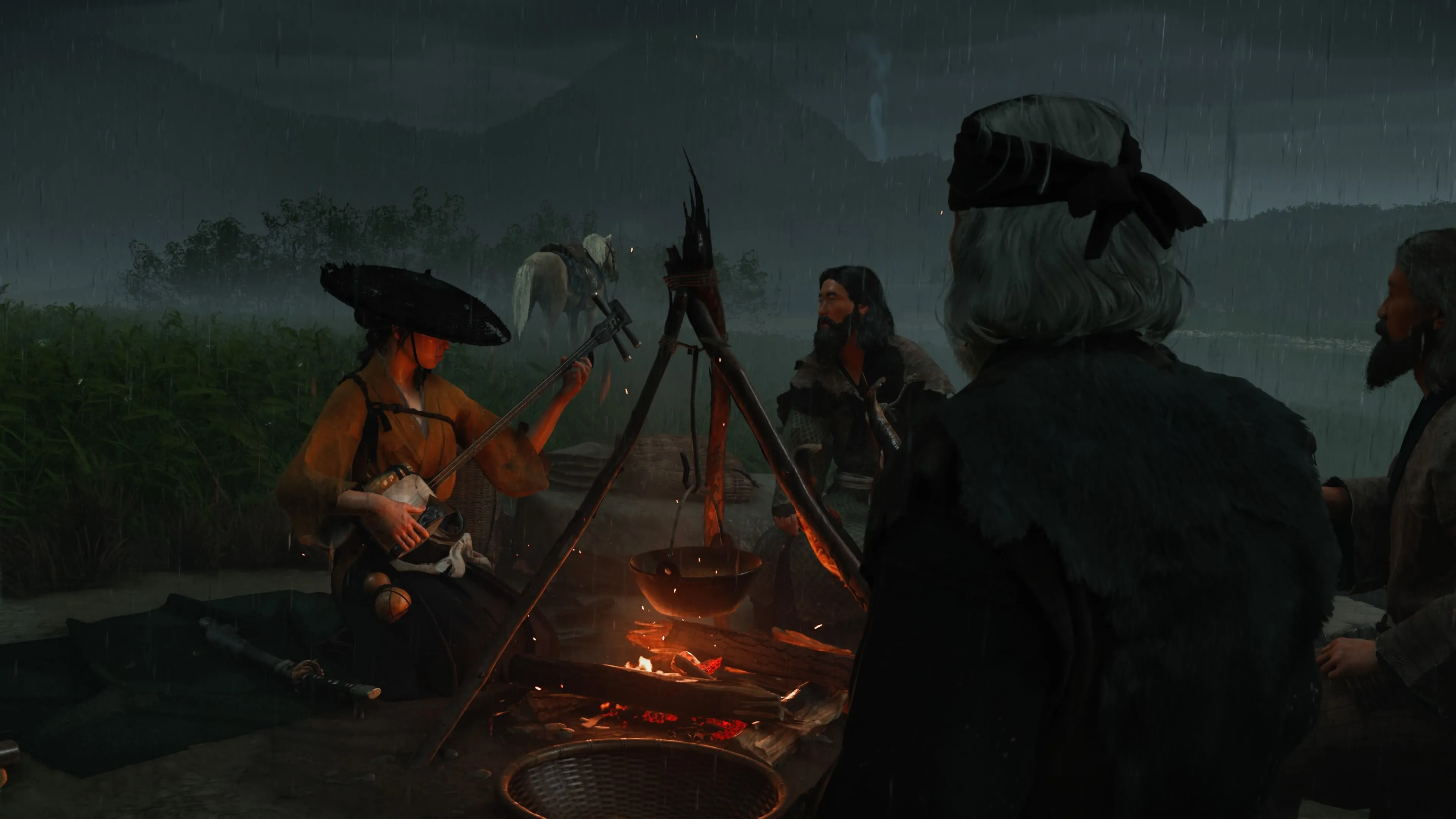 Atsu ngồi trò chuyện cùng lữ khách bên lề con đường trong thế giới mở Yotei