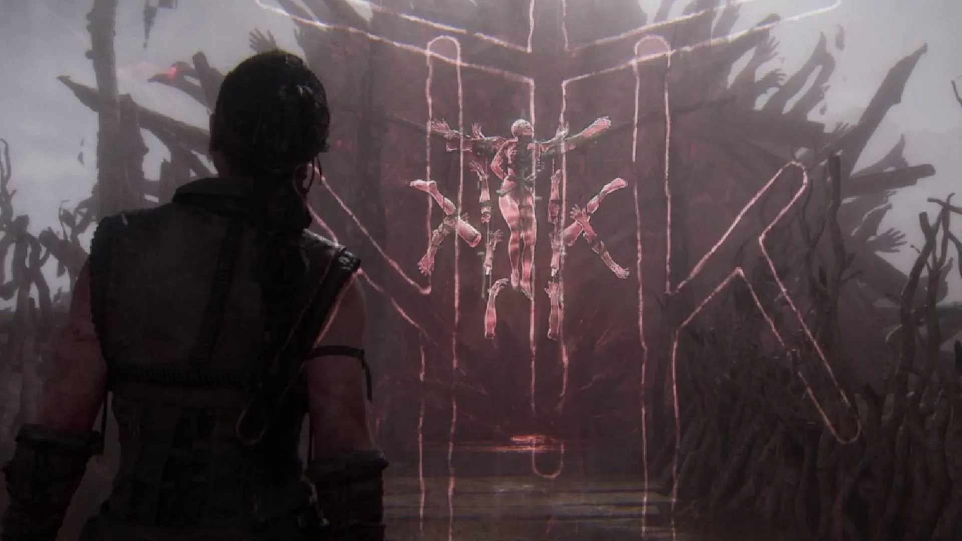 Senua's Saga Hellblade 2 - chân dung nhân vật Senua với bối cảnh lửa, phản ánh sự thay đổi tông so với bản gốc tâm lý